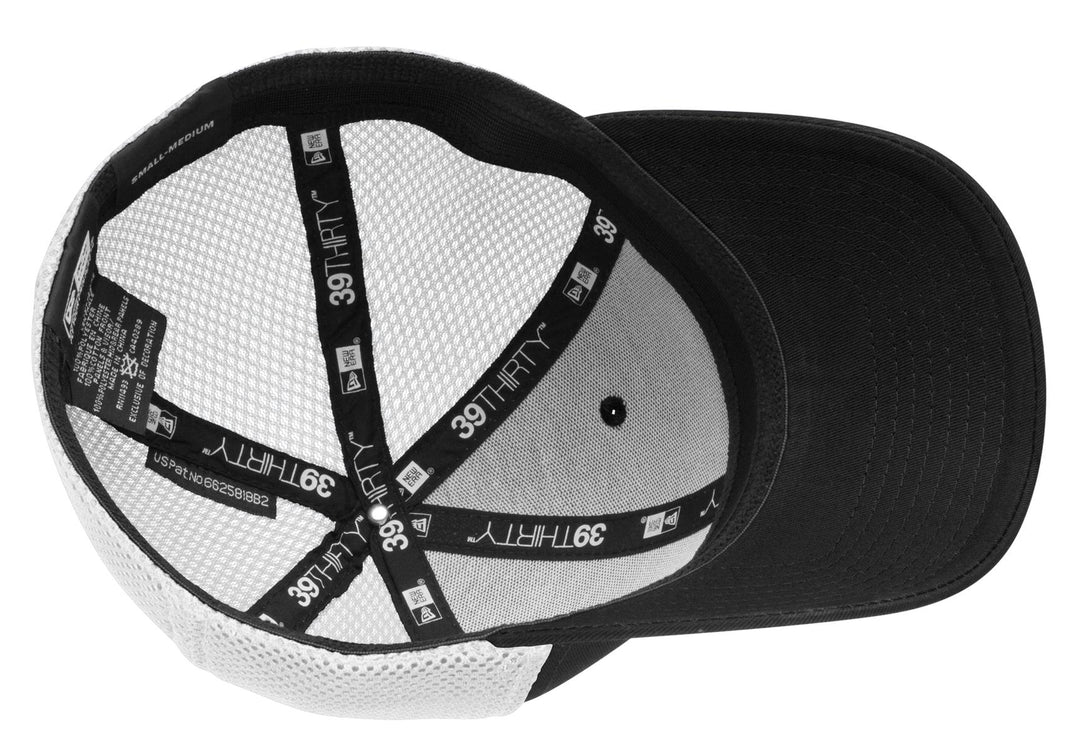 New Era - Stretch Mesh Cap.  NE1020 — Black/ White — front